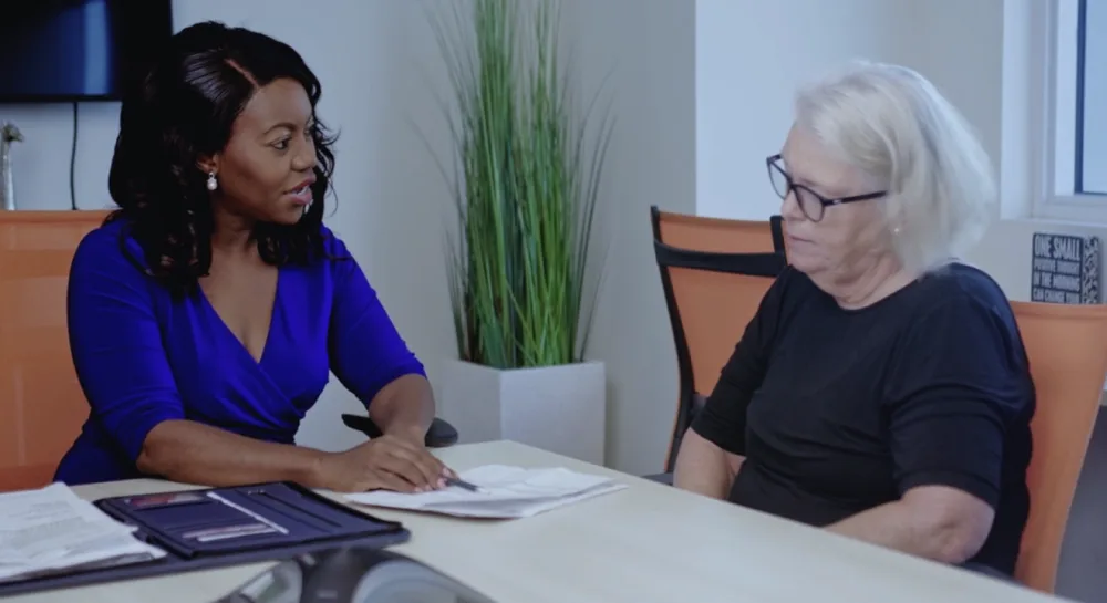 Attorney consulting with client on estate planning